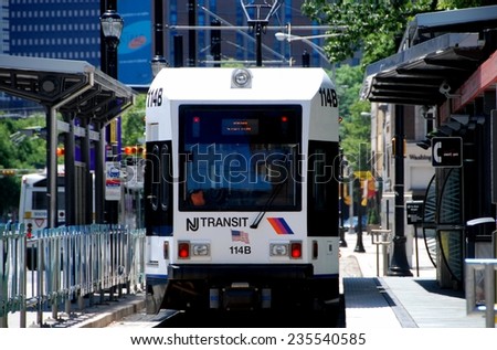Newark, New Jersey - July 18, 2012: NJ Transit light rail trolley stopped at the Washington Park station