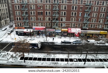 New York City - January 6, 2015:  View of Broadway at West 143rd Street during the first snowy day of Winter 2015