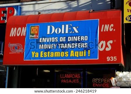 New York City - November 25, 2006:  Bilinguall signs in Spanish and English on an Amsterdam Avenue shop near Columbia University in upper Manhattan