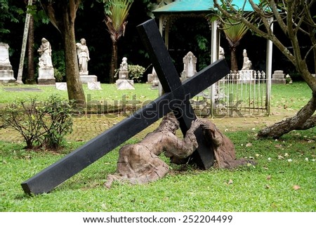 Singapore - December 12, 2007:  One of the twelve stations of the cross depicting Jesus carrying his cross in the 1835 Armenian Church burial ground