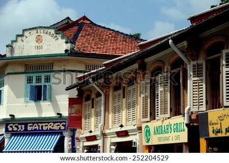Singapore - December 17, 2007:  Middle Eastern restaurants located in former 19th century Chinese shop houses in the historic Kampong Glam Arab quarter