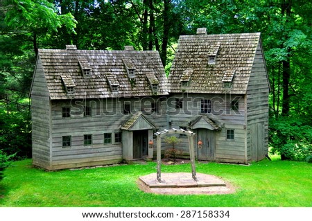 Ephrata, Pennsylvania - June 6, 2015:    Two charming reconstructed wooden amphitheatre houses at the 18th century Ephrata Cloister Germanic religious settlement  *