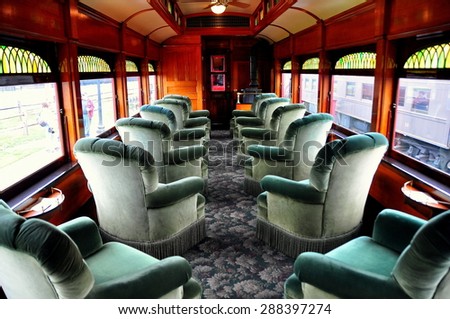 Strasburg, Pennsylvania - June 5, 2015:  First Class Lounge Car with plush swivel chairs on a vintage Strasburg Railroad passenger car  *