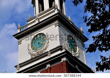 Philadelphia, Pennsylvania - June 25, 2013:  Four clock faces decorate the Georgian tower of historic 1732-1753 Independence Hall in Independence National Park