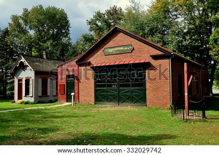 Lancaster, Pennsylvania - October 14, 2015:  The 19th century Tin Shop (left) and Pioneer Fire Company at the Landis Valley Village and Farm Museum