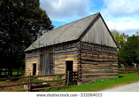 Lancaster, Pennsylvania - October 14, 2015:  Circa 1750 Germanic fachwerk Log Farm home at the Landis Valley Village and Farm Museum *