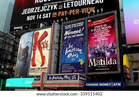 New York City - November 15, 2015:  Billboards advertising hit Broadway musicals Kinky Boots, An American in Paris, and Matilda in Times Square *