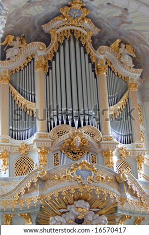 Beautiful golden pipe organ in a church in germany