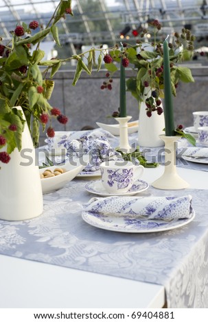 A trendy and beautiful decorated dining table setting.