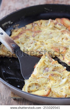 Classic spanish tortilla with potatoes and onions.