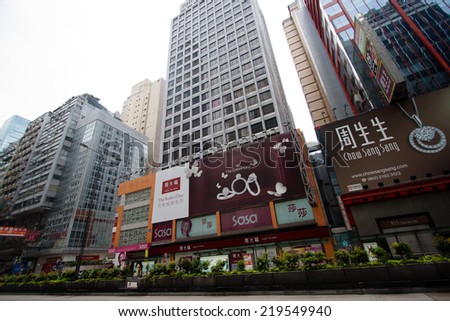 HONG KONG - JUN 13 : Nathan Road is the main thoroughfare in Hong Kong that goes in a south-north direction from Tsim Sha Tsui to Mong Kok. It is lined with shops and restaurants on June 23, 2013.