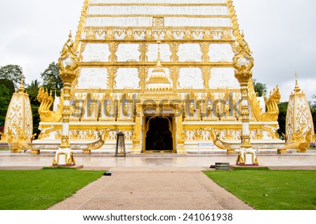 Ornament: architecture landscape of white and gold pagoda at wat Phrathat Nong Bua in Ubon Ratchathani province, Thailand