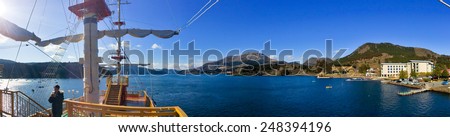 HAKONE, JAPAN - MARCH 22: Panorama of Hakone Lake, Mount Fuji and the famous pirate sight seeing ship in Japan in March 22, 2014
