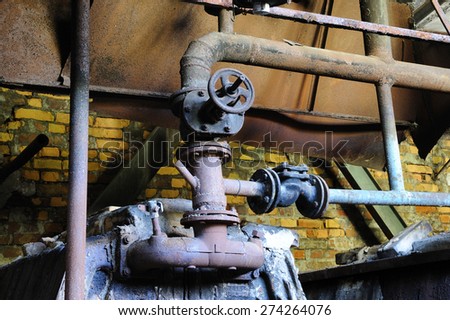 Old and rusty pipe in the boiler