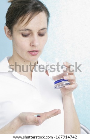 Woman Taking Medication