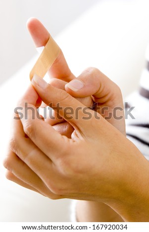 Woman Dressing Wound