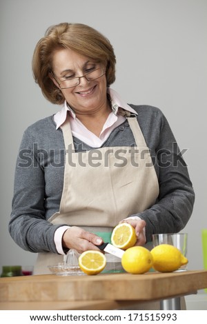 Elderly Person Eating Fruit
