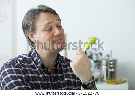 Man Eating Salad