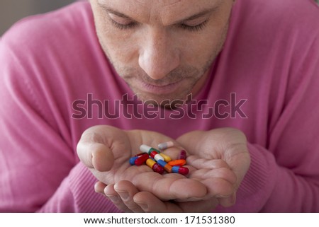 Man Taking Medication
