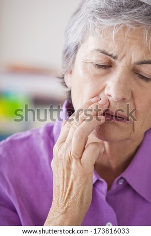 Elderly Person With A Toothache