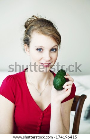 Woman Eating Raw Vegetables