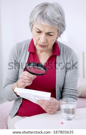 Elderly Person Taking Medication