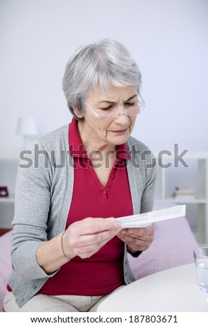 Elderly Person Taking Medication