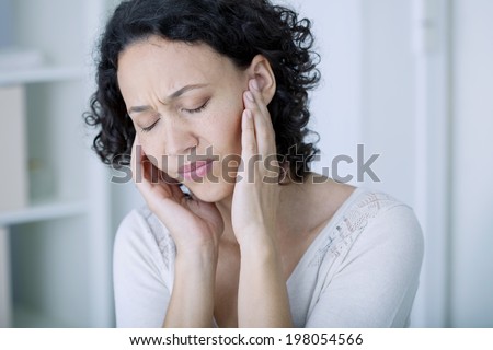Ear pain in a woman