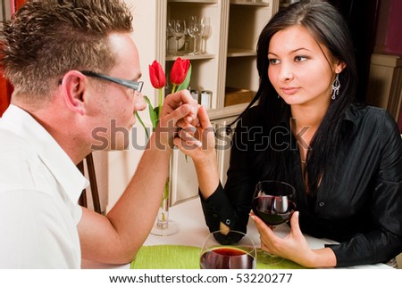 young couple in love drinking wine