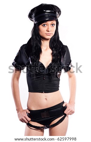 Sexy woman with police uniform in studio