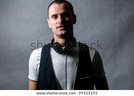 dj with headphones on white background