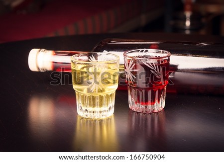 Two glasses of alcoholic drinks on the table