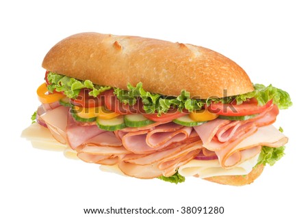 stock photo : Delicious ham, turkey &amp; cheese sandwich on white 