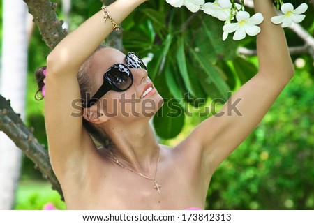 Woman enjoying day in Maldives, beautiful peaceful relaxed female