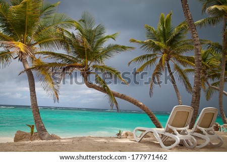 Sea Before The Storm, Tropical Paradise. Canvas Chairs On Tropical Beach. Concept For Rest, Relaxation, Holidays, Resort.