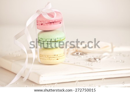 Soft pastel vintage still life with macaroons, wedding style. Holidays and celebrations.