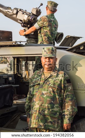 CHONBURI, THAILAND - JAN 18, 2014 Unidentified marines and tank with cannon performing military parade of Royal Thai Navy on January 18, 2014 at Sattahip Naval Base, Chonburi, Thailand