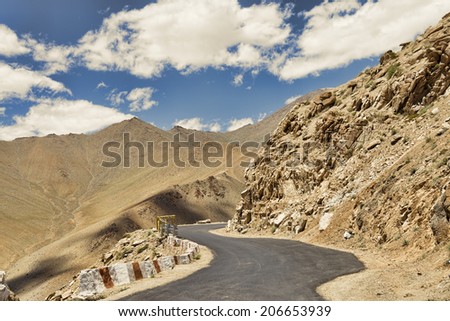 Twisting road in desert mountains