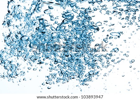 closeup of bubbles in water isolated on white background