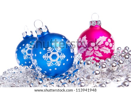 christmas balls with tinsel isolated on white background