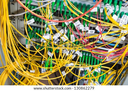 server with fiber optic  cables in data center