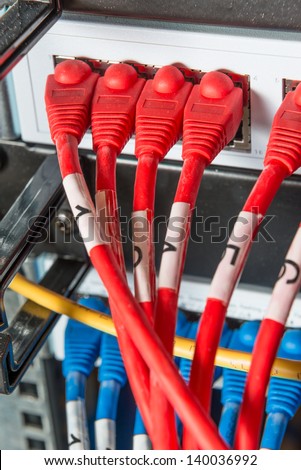 close-up of network hub and ethernet cables