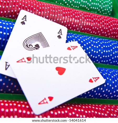 colorful poker chips with ace card