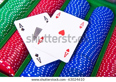 colorful poker chips with ace card