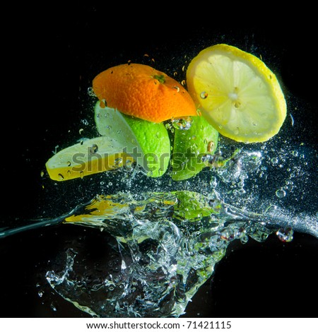 fruit splashing in the water