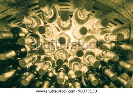 stacked up wine bottles in the wine cave