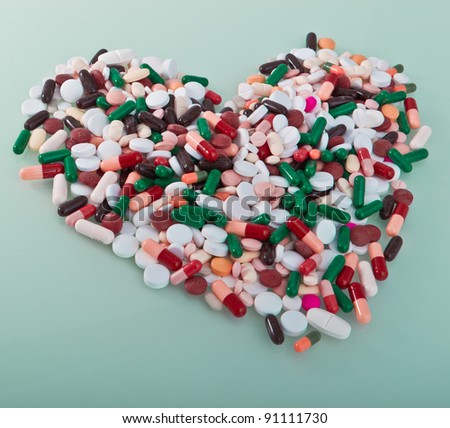 colorful pills in a shape of heart