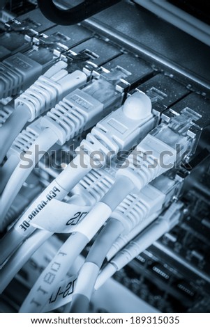 close-up of network hub and ethernet cables