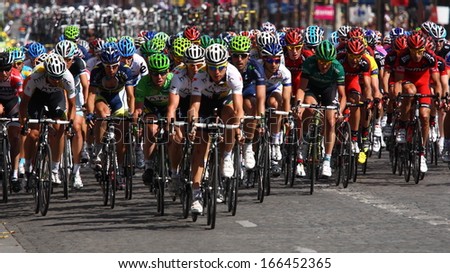 Paris, Jul 24: The Peloton Riding During The Final Stage Of The &Quot;Tour De France 2011&Quot; On Avenue Des Champs Elysees On 24 July 2011 In Paris, France.