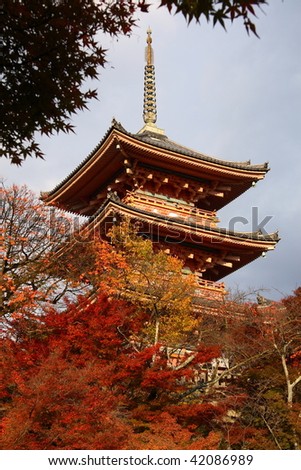Famous pagoda of Kiyumizu Dera temple in autumn with a grey sky(Kyoto, Japan)